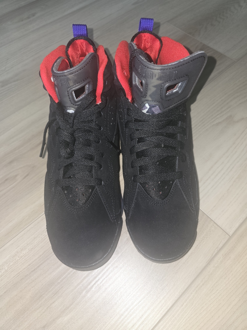 Jordan Black High-Top Sneakers with Red Interior and Purple Heel Tabs